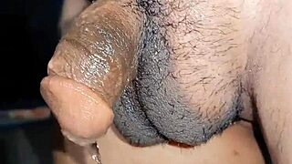 in this homemade video, a feminine sissy fingers her asshole while standing and pissing