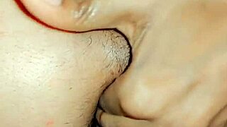in this homemade video, a feminine sissy fingers her asshole while standing and pissing