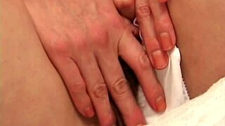 Japanese housewife fingers her pussy while husband sleeps