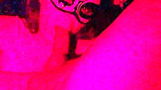 Masked girl sucks cock under red lights 😈