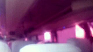 Brunette amateur masturbates outdoors on bus, spreading pussy publicly