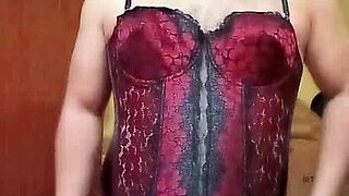 shirley dances seductively in red-black corset