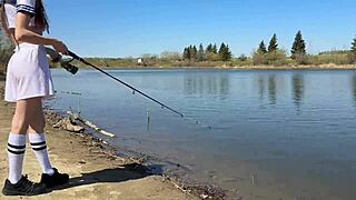 young angler girl fishes after school