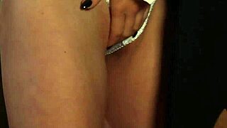 Blonde slave engages in kissing and touching with dominant madame