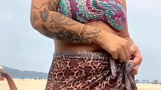 i stayed naked on the beach, the guy got hard, and i grabbed his dick