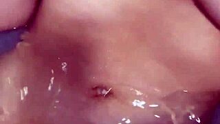 Horny british slut plays with herself in the shower