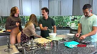 the family enjoys freeuse during their wanksgiving celebration