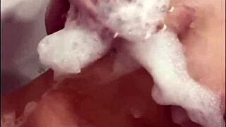 Horny british slut plays with herself in the shower