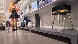 the blonde bombshell pleasures her tight ass in the store's fitting room