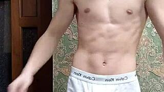Skinny boy flexes in tight underwear