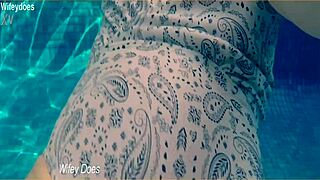 wife flashing tits in hotel pool?