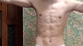 Skinny boy flexes in tight underwear