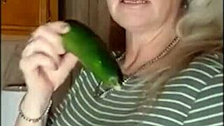She fucks her zucchini dildo hard until she cums