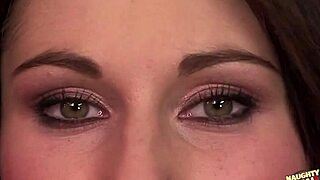 adorable brunette strips seductively