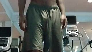 Athletic brunette performs pole dance in the dorm, showcasing her fitness and beauty to roommates