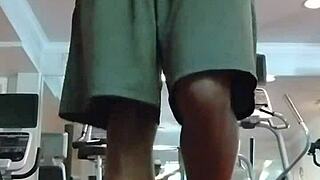 Athletic brunette performs pole dance in the dorm, showcasing her fitness and beauty to roommates