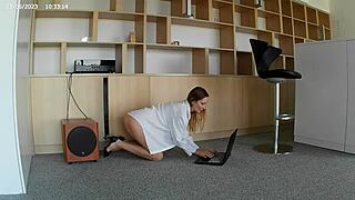 The hot milf strips in lingerie and stockings.