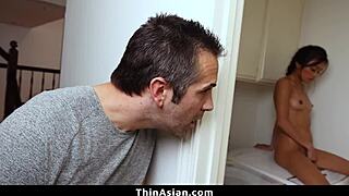 asian babe gets caught playing with huge dildo