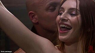 Slim redhead gets anal fucked in tight bondage