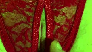 Shaved pussy in red thongs all wet from fingering