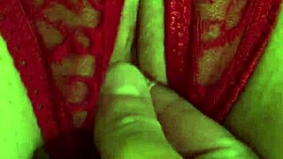 Shaved pussy in red thongs all wet from fingering