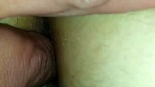 Husband fucks wife's ass while she's tied up.