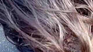 Sucking on balcony, pussy exposed