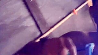 intense solo rap performance with powerful delivery in intimate setting