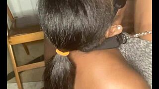 thick ebony woman with large natural tits wearing fishnets collared and leashed