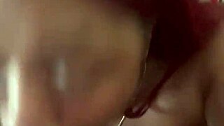 Slutty redhead deepthroats big black cock and gags