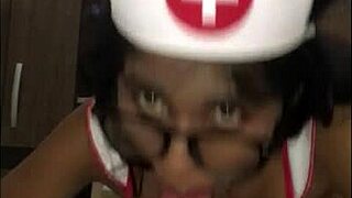 Latina Nurse Treats Young Patient