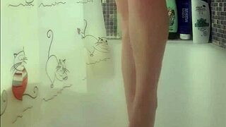 Busty teen washes her perfect feet in shower