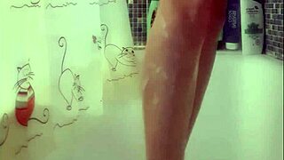 Busty teen washes her perfect feet in shower