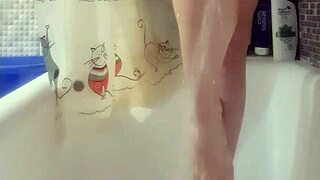 Busty teen washes her perfect feet in shower