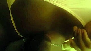 She unwinds in bed, sucking a massive black cock before sleep.