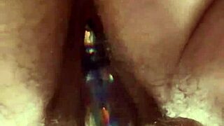 Up close hairy pussy glass dildo masturbation reveals tantalizing contrasts