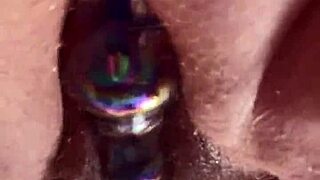 Up close hairy pussy glass dildo masturbation reveals tantalizing contrasts