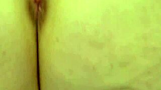 fiery mature red, busy with dildo between legs?