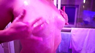 this latina plays with soap and makes bubbles before showering