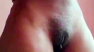 Amateur ebony milf plays with her big ass and shaved pussy in close up