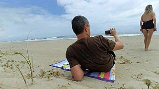 a fat dick in the ass perked up a milf dozing on the beach