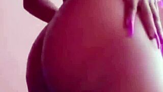 Amateur ebony milf plays with her big ass and shaved pussy in close up