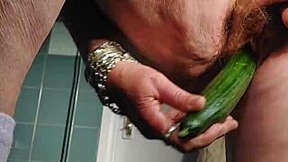 Wow, grandma is fucking her hairy pussy with a cucumber! So intense!