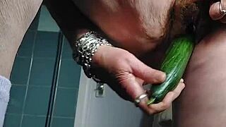 Wow, grandma is fucking her hairy pussy with a cucumber! So intense!