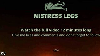 Goddess Sandy teases with nylon feet on beach at sunset.