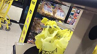 Two moms casually browsing the shop