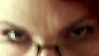 Glassed-up Karla Rose kneels for pov blowjob on wrapped cock