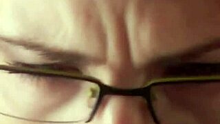 Glassed-up Karla Rose kneels for pov blowjob on wrapped cock