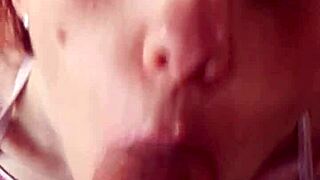 Glassed-up Karla Rose kneels for pov blowjob on wrapped cock