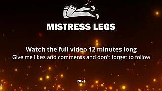 Goddess Sandy teases with nylon feet on beach at sunset.